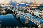 The Chattanooga watercolor skyline canvas captures a vibrant cityscape with bridges over a river, set against mountains and dynamic clouds reflecting on the water. Ideal for digital download or canvas wall art, it brings Chattanoogas charm to your space.